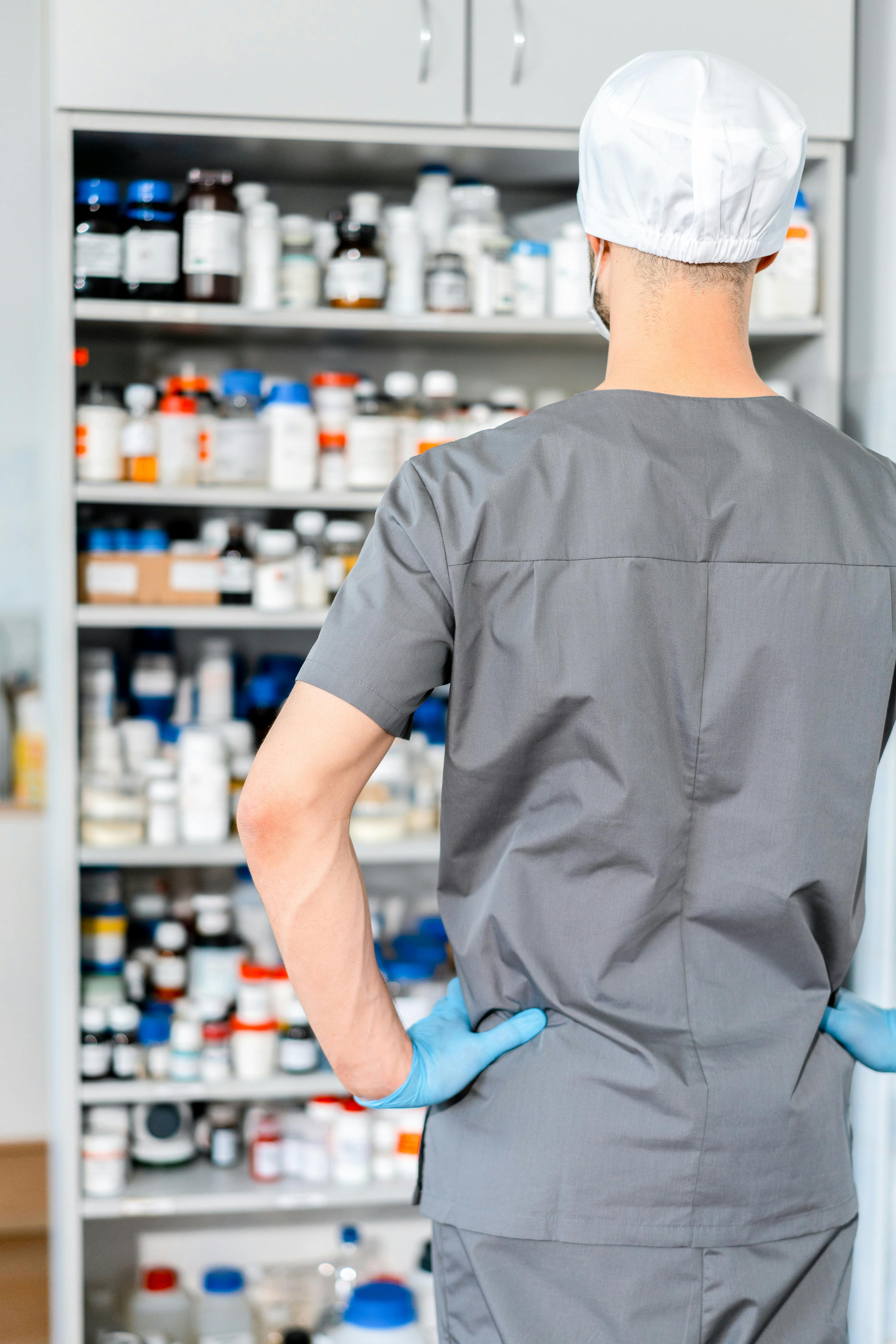 pharmacist standing in pharmacy