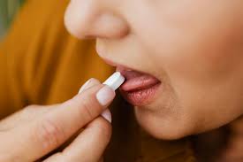 person taking medicine