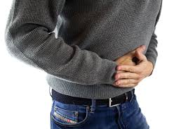 man holding his stomach