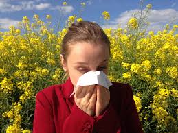 women having allergy around flowers