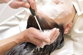 putting cream on scalp