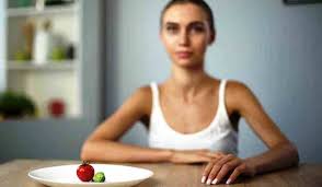 woman with bulemia sitting on chair 