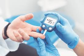 checking blood sugar level with machine