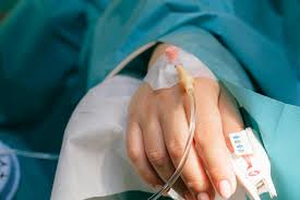 intravenous fluid on right hand