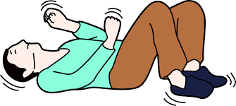 man on the floor having seizures