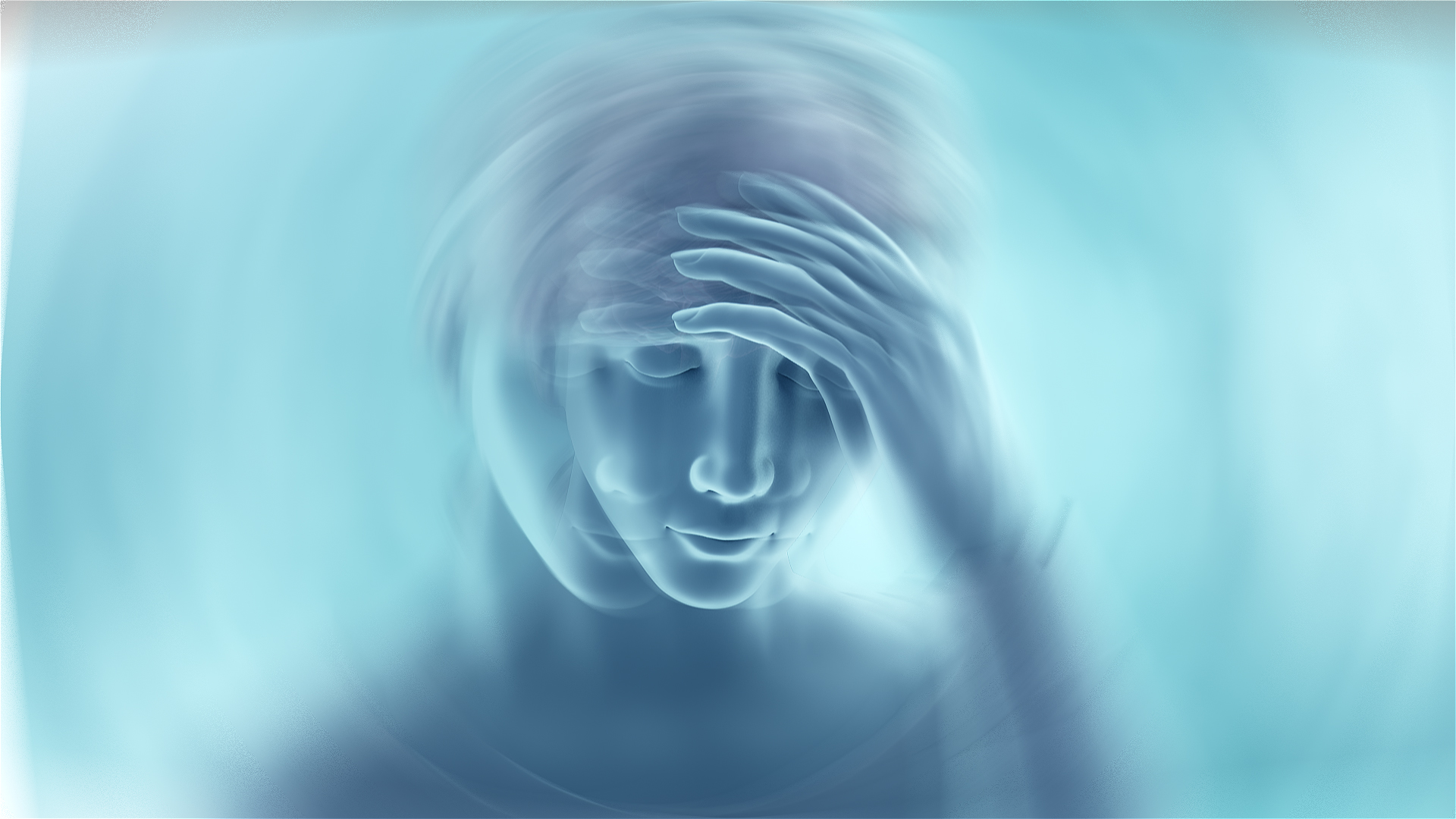 person with hand on head feeling vertigo