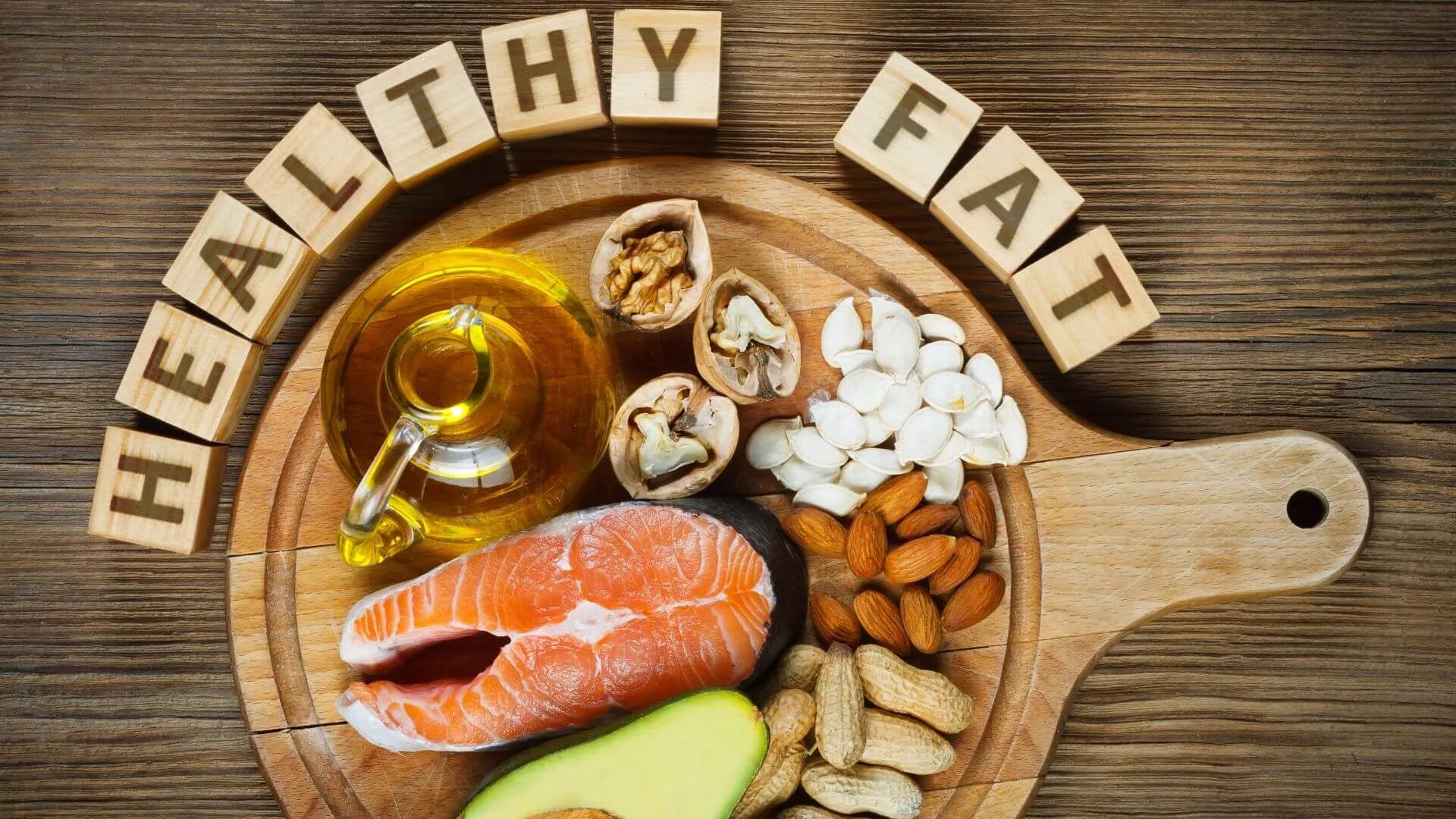 healthy fat with foods on the wood board fish