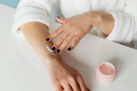 cream application on hand