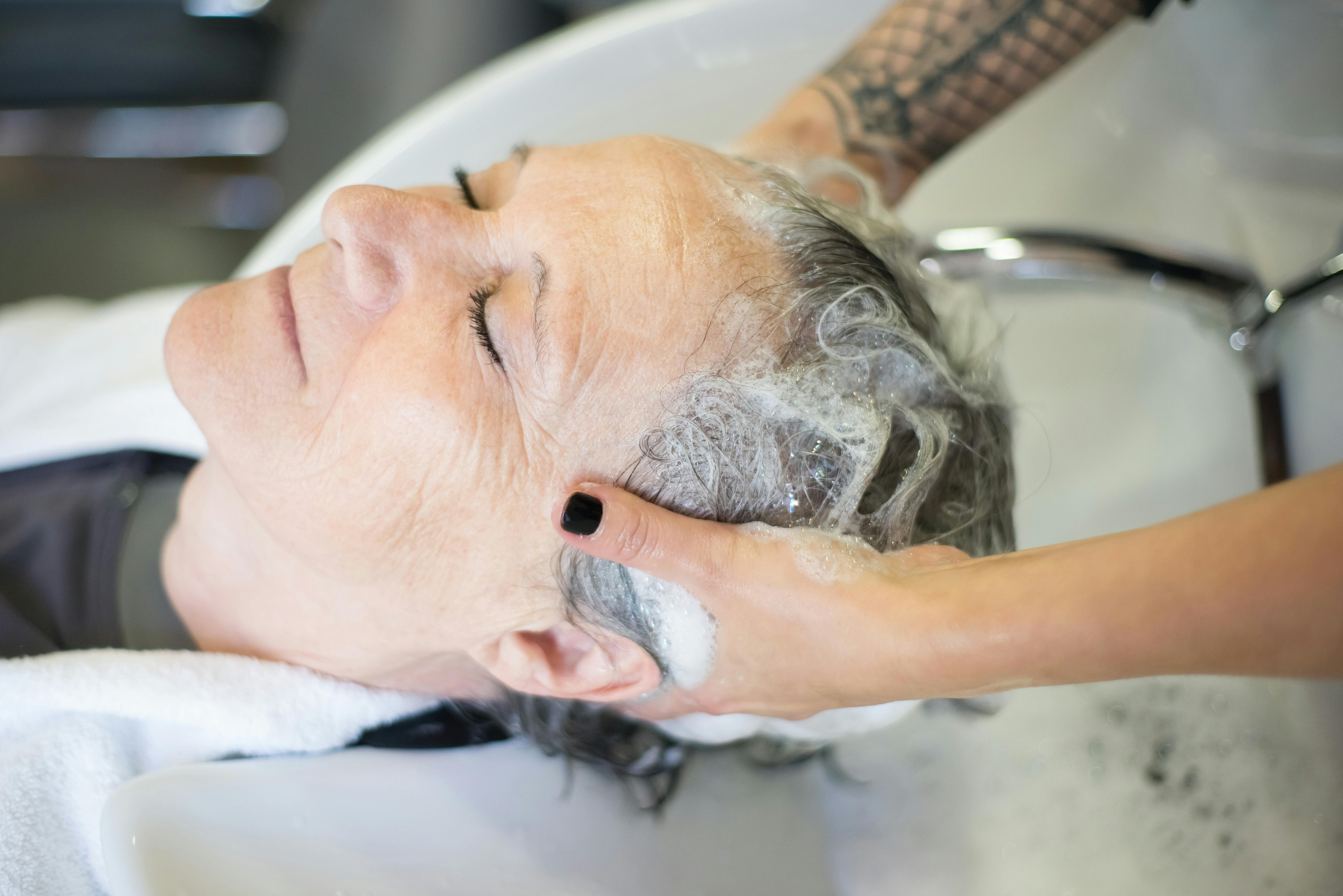 person being shampooed