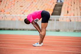athlete stretching