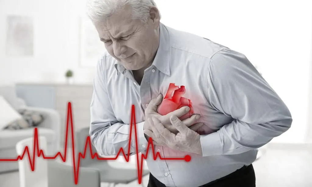 old man with hand on his chest 