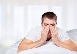 man feeling drowsy 